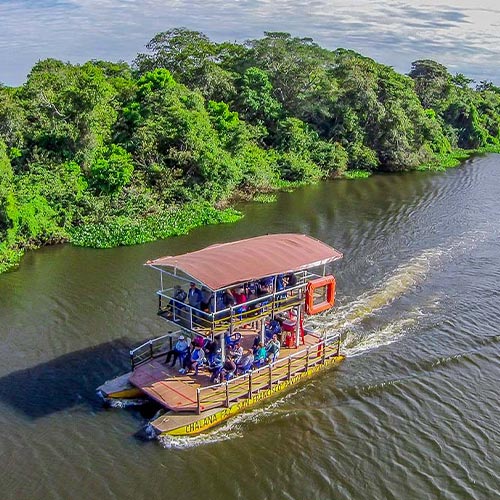 Hotel boat in the Pantanal crossing a river
